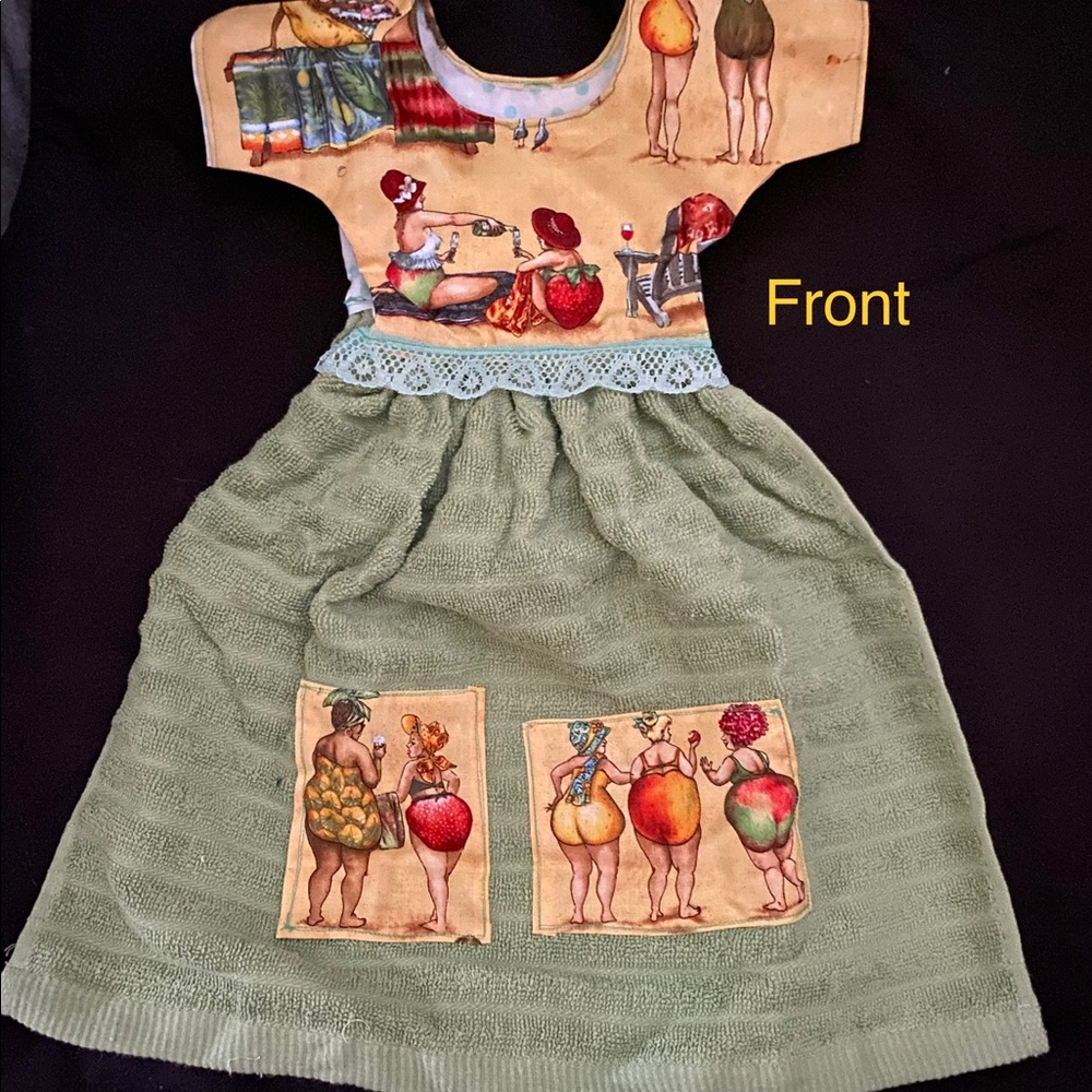 Cute fruity bottom ladies on a dress shaped hand towel.